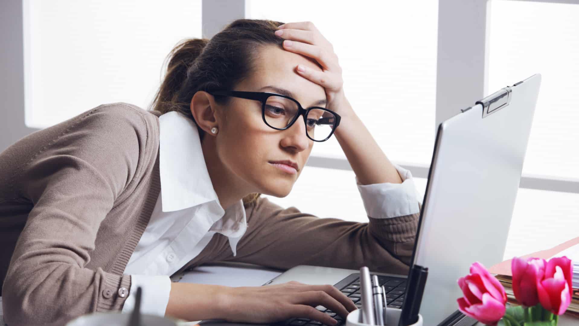 frustrated lady at desk-how to shake off a bad day