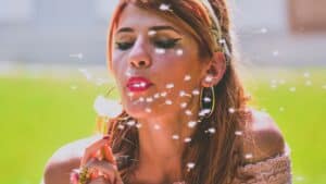 lady blowing a flower-examples of personal goals to set