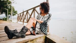 women over 50-lady sitting on a dock
