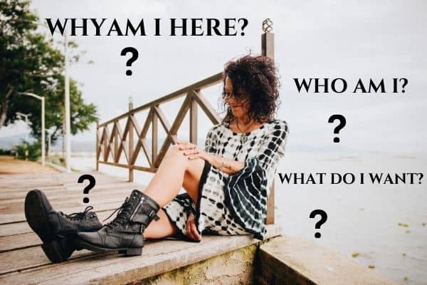 woman sitting on dock-how to change your life at 50
