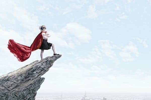girl on mountain with cape on-how to change your life at 50