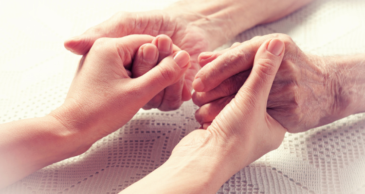 hands holding-caring for aging parents article