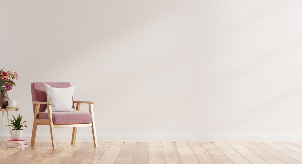 small pink chair in room, minimalist life