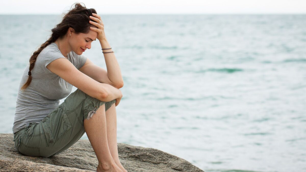 sad woman sitting alone