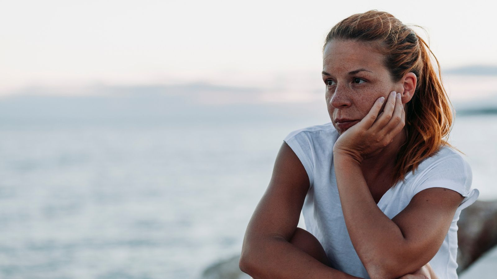 sad woman at beach