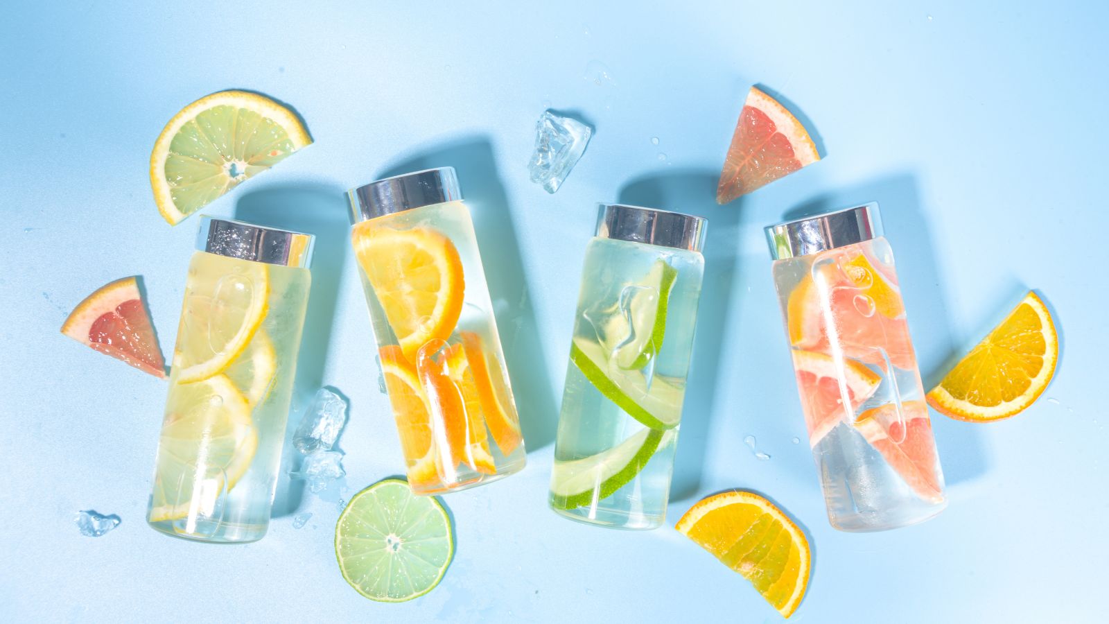 travel essentials, water bottles, water with fruit