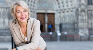 happy woman over 50 reinvent yourself
