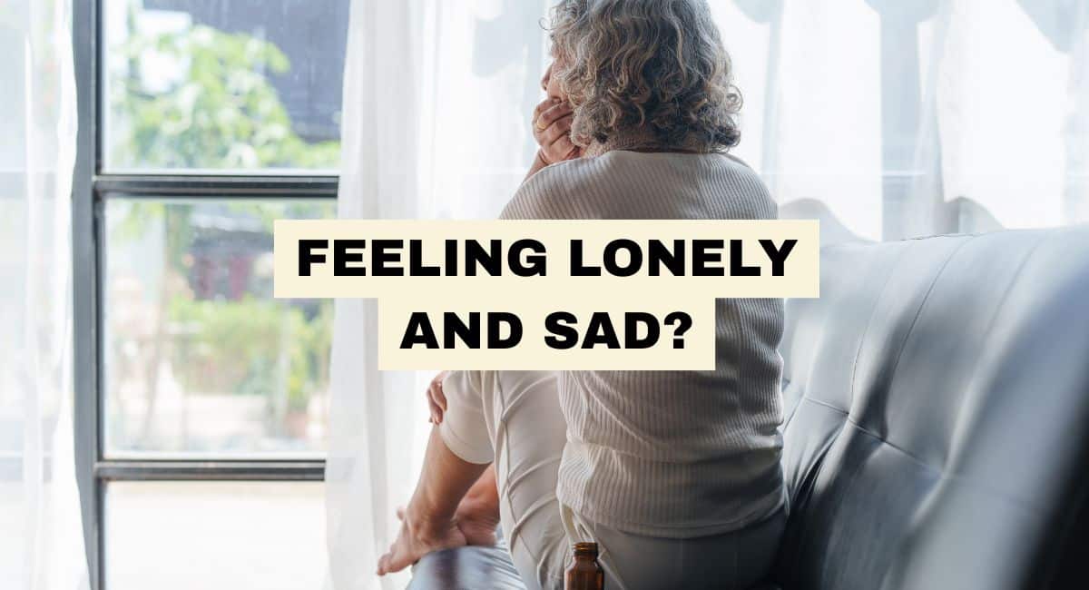 FEELING LONELY AND SAD WOMAN AT WINDOW