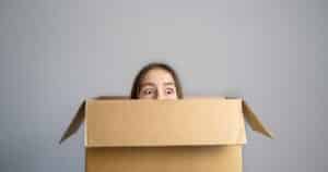 leave your comfort zone, woman in a box