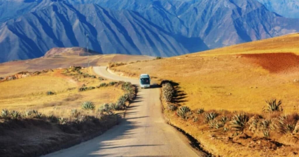 moving to a new country bus driving through the mountains